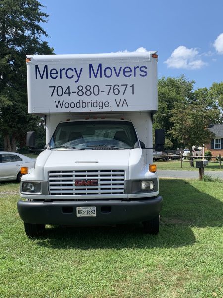 Mercy Movers sign truck services